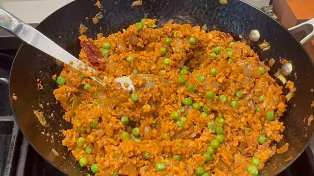 Finished vegan keema with green peas in a black wok