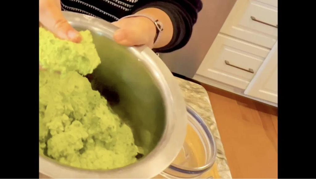 hands showing falafel dough