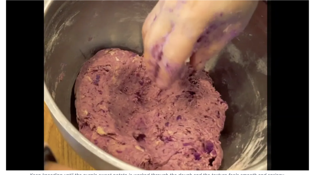 hands in purple dough